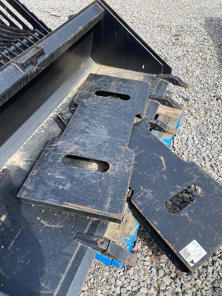 Skid steer back plates